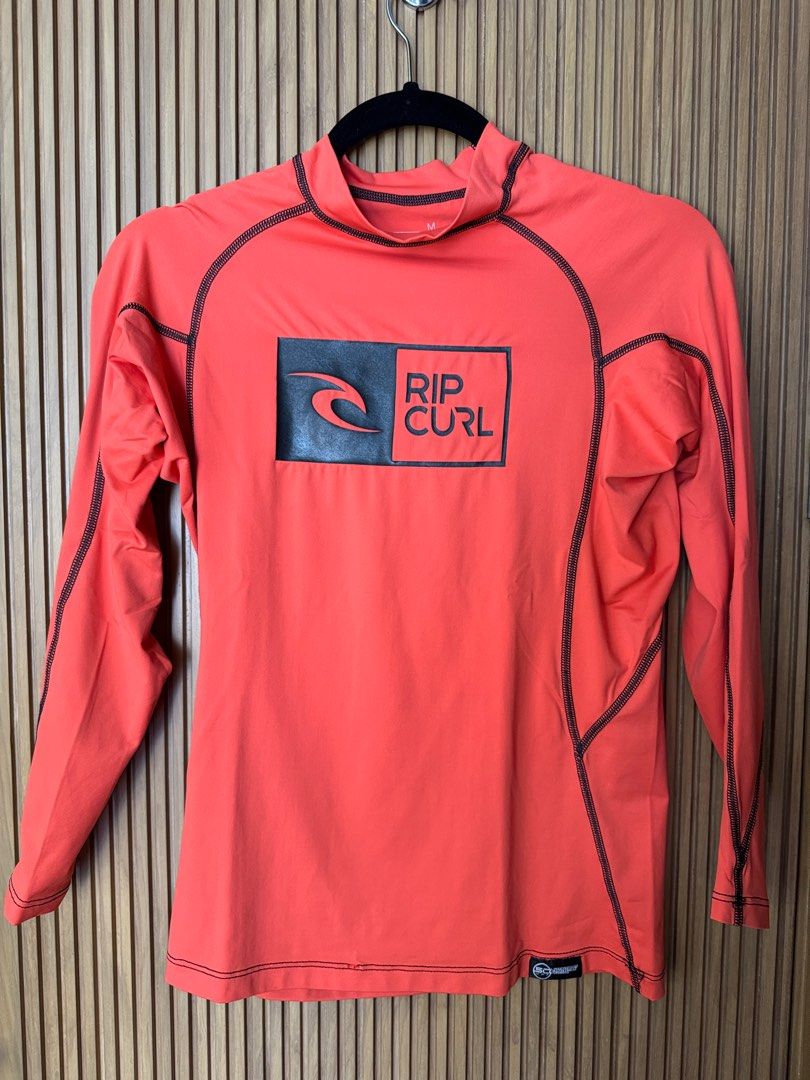 Ripcurl Orange Long Sleeves Rash Guard (Category: Activewear) located in Makati City. Submitted by kytriestosell (Listing ID 1407439615, Image 1). Description: - authentic ripcurl rash guard.