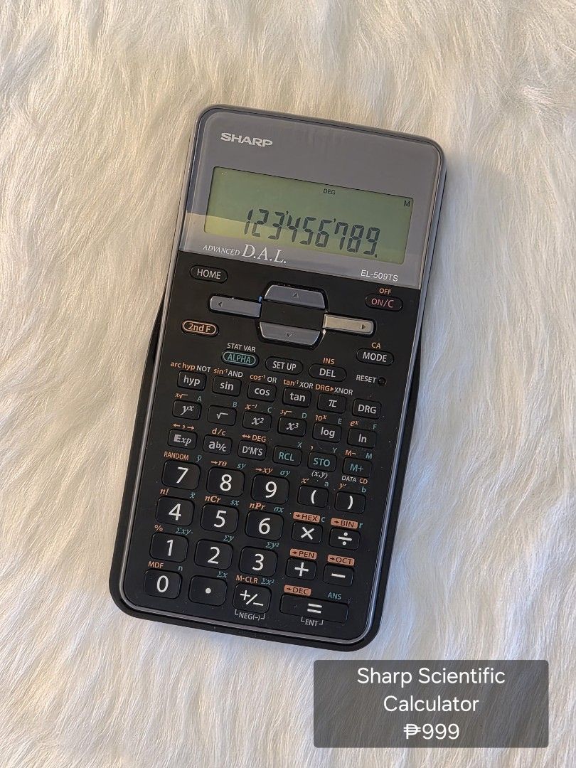 SHARP Scientific Calculator (Category: Samsung) located in Manila. Submitted by kamiverse (Listing ID 1407405062, Image 1). Description: - SHARP Scientific Calculator - Excellent condition - Fully functional - Suitable for students and professionals - Features a durable design.
