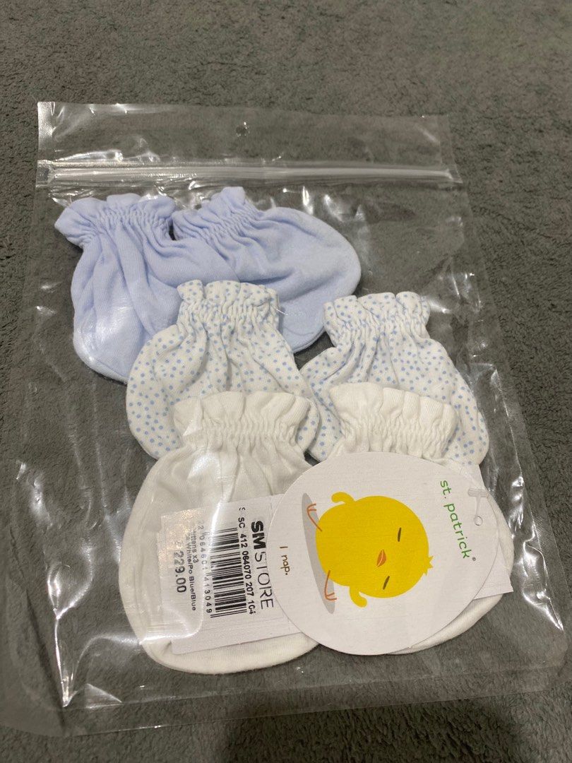 St patrick baby mittens set (Category: Babies & Kids Fashion) located in Binan City. Submitted by _bevalmazora (Listing ID 1407408009, Image 1). Description: - St. Patrick baby mittens set - Suitable for newborns - Includes multiple pairs - Features various designs and colors.