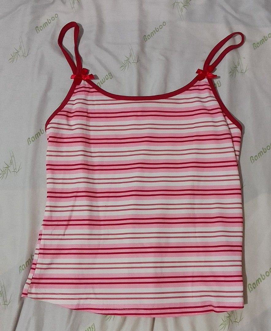 Striped Camisole with Bows | S-M (Category: Sleeveless) located in Pasig City. Submitted by lizasxnw (Listing ID 1407453310, Image 1). Description: - Pink and white striped camisole - Red straps and trim - Ribbed fabric - Adorable bows at strap attachments - Comfortable and stylish - Great for everyday wear.