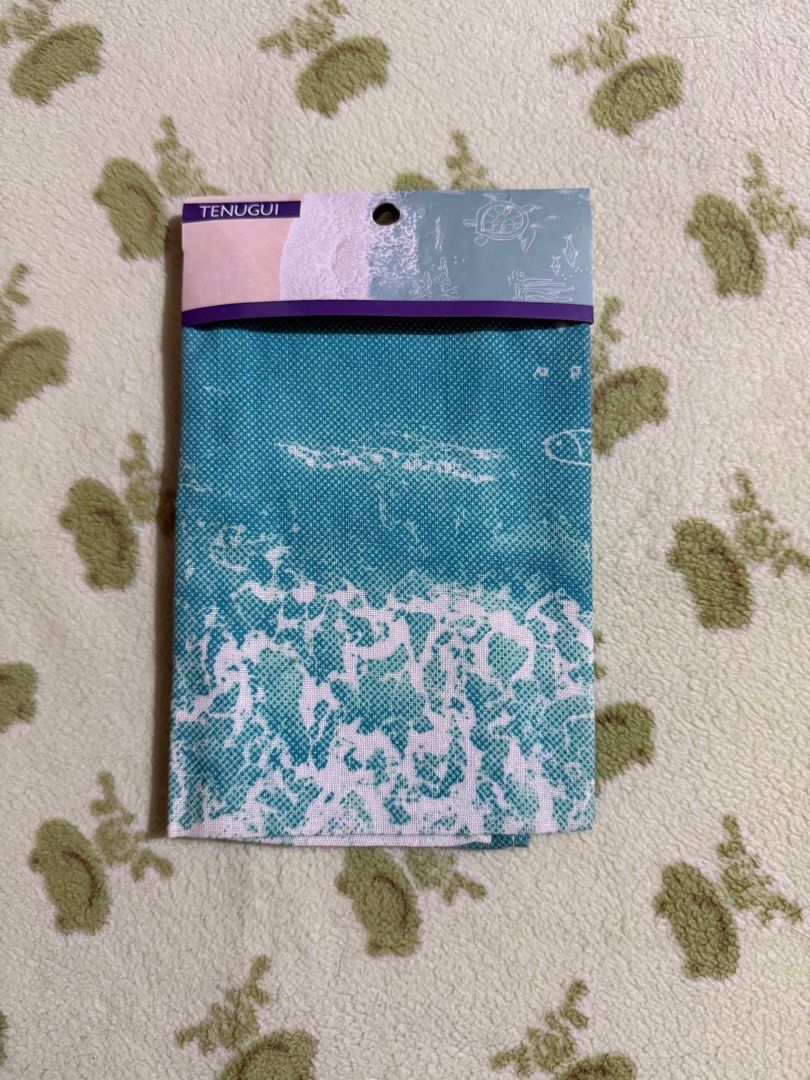 Tenugui Japanese Towel - Wave Design (Category: Bedding & Towels) located in Quezon City. Submitted by skyeseller (Listing ID 1407489191, Image 1). Description: - New Tenugui towel - Features a beautiful wave design - Teal fabric with white wave pattern - Traditional Japanese hand towel.