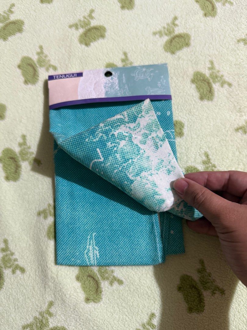 Tenugui Japanese Towel - Wave Design (Category: Bedding & Towels) located in Quezon City. Submitted by skyeseller (Listing ID 1407489191, Image 2). Description: - New Tenugui towel - Features a beautiful wave design - Teal fabric with white wave pattern - Traditional Japanese hand towel.