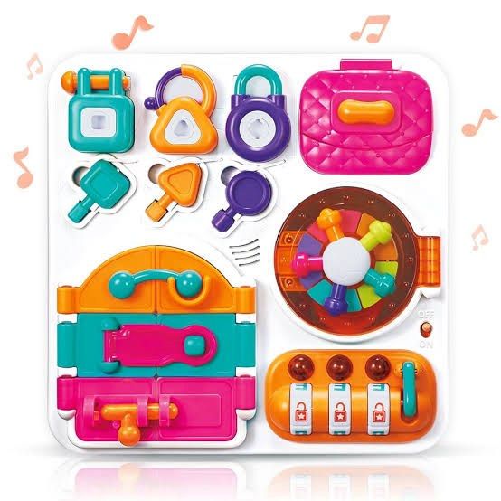 Toy Busy Board (Category: Educational & Learning Toys) located in Manila. Submitted by captain_siy (Listing ID 1407430650, Image 2). Description: - Busy Board for ages 18 months+ - Features 9 different locks to explore - Includes lights, sounds, and tactile elements - Activities: unlocking mini rooms, safe cracker, number-coded quest - Encourages independence and safe exploration - Builds emotional bonds and creates joyful moments.