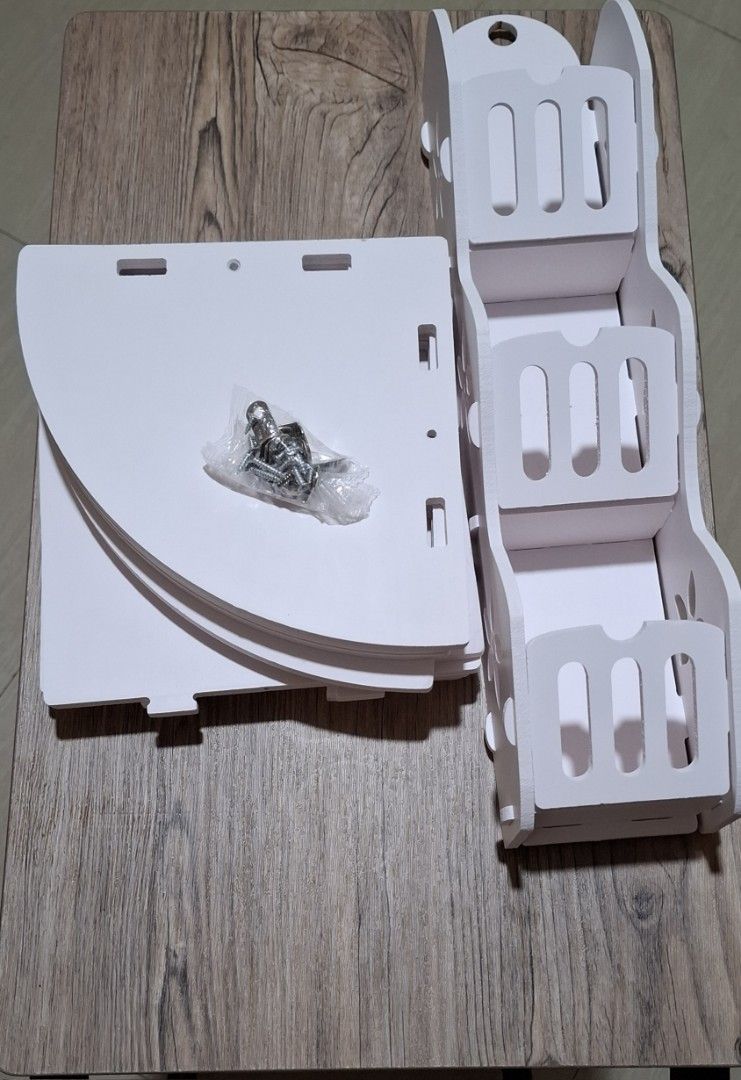 Wall Mount White Corner Shelves (Category: Shelves, Cabinets & Racks) located in Manila. Submitted by dm_ca (Listing ID 1407564906, Image 1). Description: White corner wall shelf. Multi-tiered design for display or storage. Easy to install, space-saving. Take both.