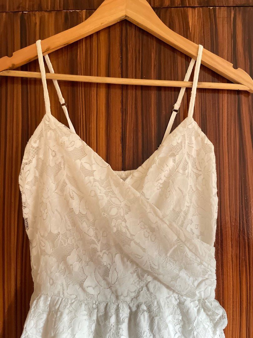 White textured dainty dress (Category: Dresses) located in Cebu City. Submitted by chloeverkauft (Listing ID 1407460588, Image 2). Description: - Used lightly years ago - Fits S-M frame - Still looks good and new 💖 - No flaws ❗️ 📌Take ALL listed items for 2800 !! 💖 - Will accept via gcash & bank only .