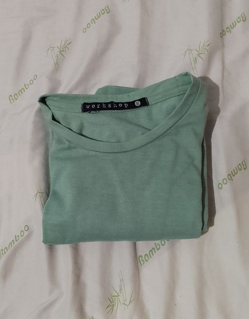 Workshop Men Green T-shirt - 2XL (Category: Tshirts & Polo Shirts ) located in Pasig City. Submitted by lizasxnw (Listing ID 1407454584, Image 2). Description: - Green Workshop t-shirt - Crew neck - Short sleeves - Soft material - Size tag visible - Solid green - Neatly folded.