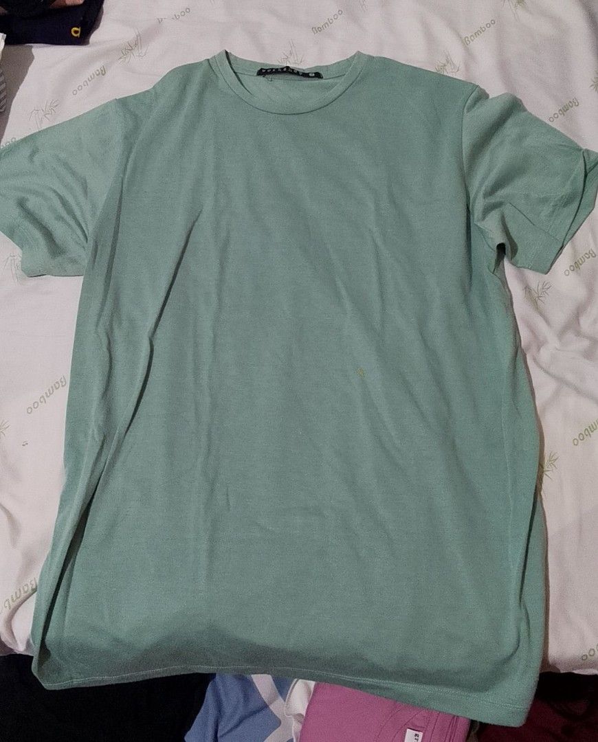 Workshop Men Green T-shirt - 2XL (Category: Tshirts & Polo Shirts ) located in Pasig City. Submitted by lizasxnw (Listing ID 1407454584, Image 1). Description: - Green Workshop t-shirt - Crew neck - Short sleeves - Soft material - Size tag visible - Solid green - Neatly folded.