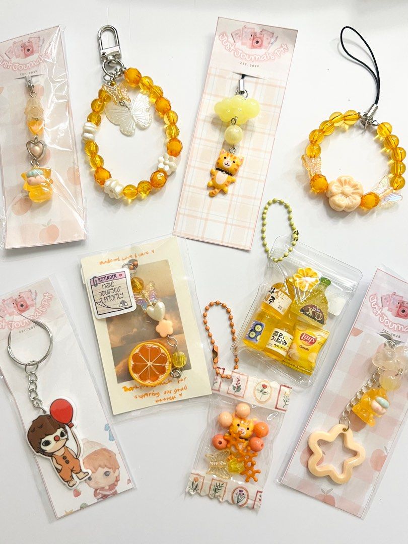 Yellow Bead Charms Keychains (Category: Charms) located in Bacoor. Submitted by MAB_Store (Listing ID 1407561486, Image 1). Description: Adorable yellow-themed keychains and charms. Features various designs including beads, butterflies, flowers, and cute figurines. Some keychains include miniature food items like chips and drinks. Perfect for adding a touch of cuteness to your bags or keys. Price ranges from 39-99 each .
