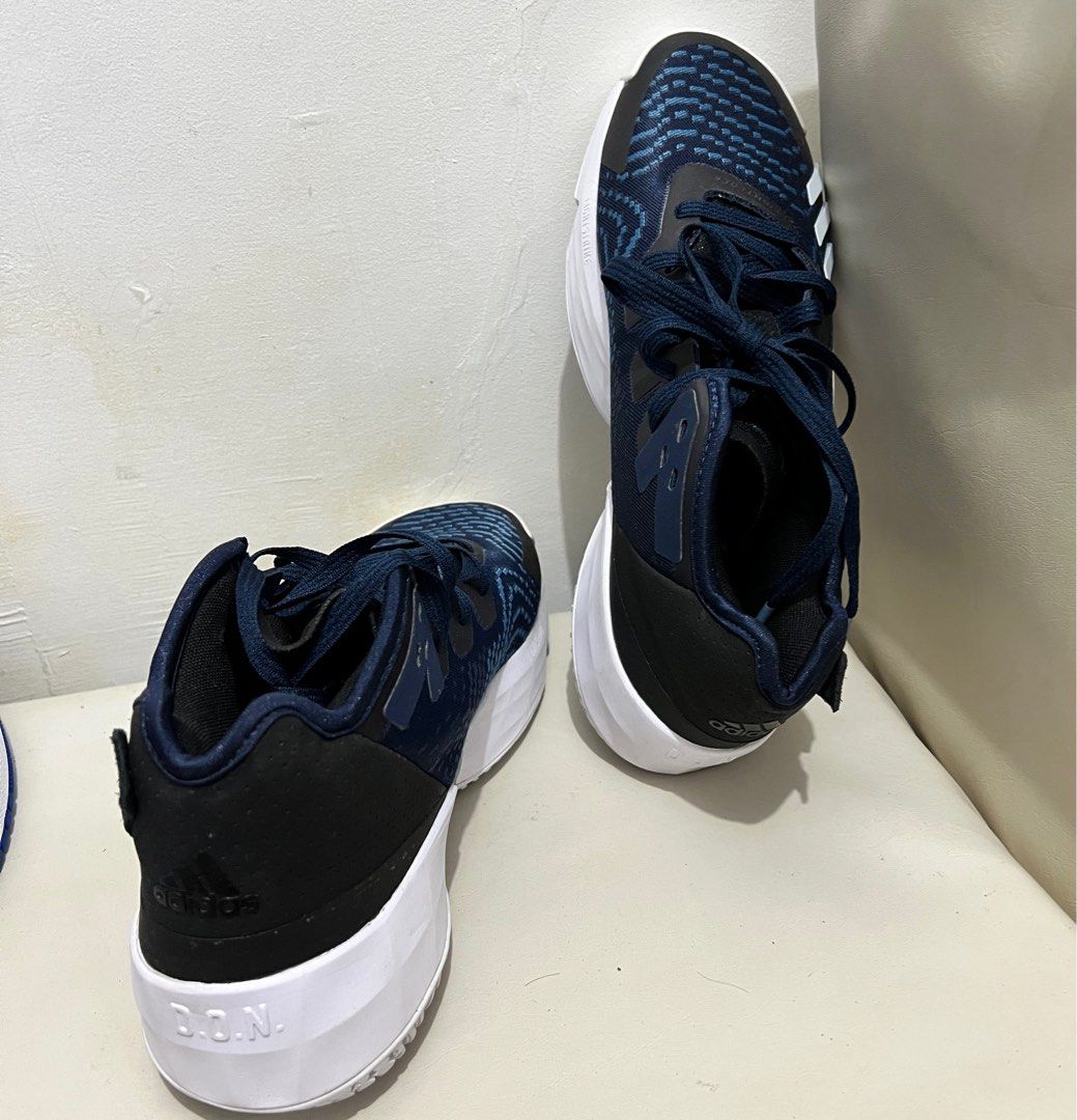 Adidas Donovan Mitchell (Category: Sneakers) located in Tiaong. Submitted by rmu57 (Listing ID 1410770149, Image 1). Description: - Adidas Donovan Mitchell basketball shoes - Color: Navy blue and white - Adidas logo on the side - D.O.N. branding on the heel - White midsole - Patterned outsole - Navy blue laces.