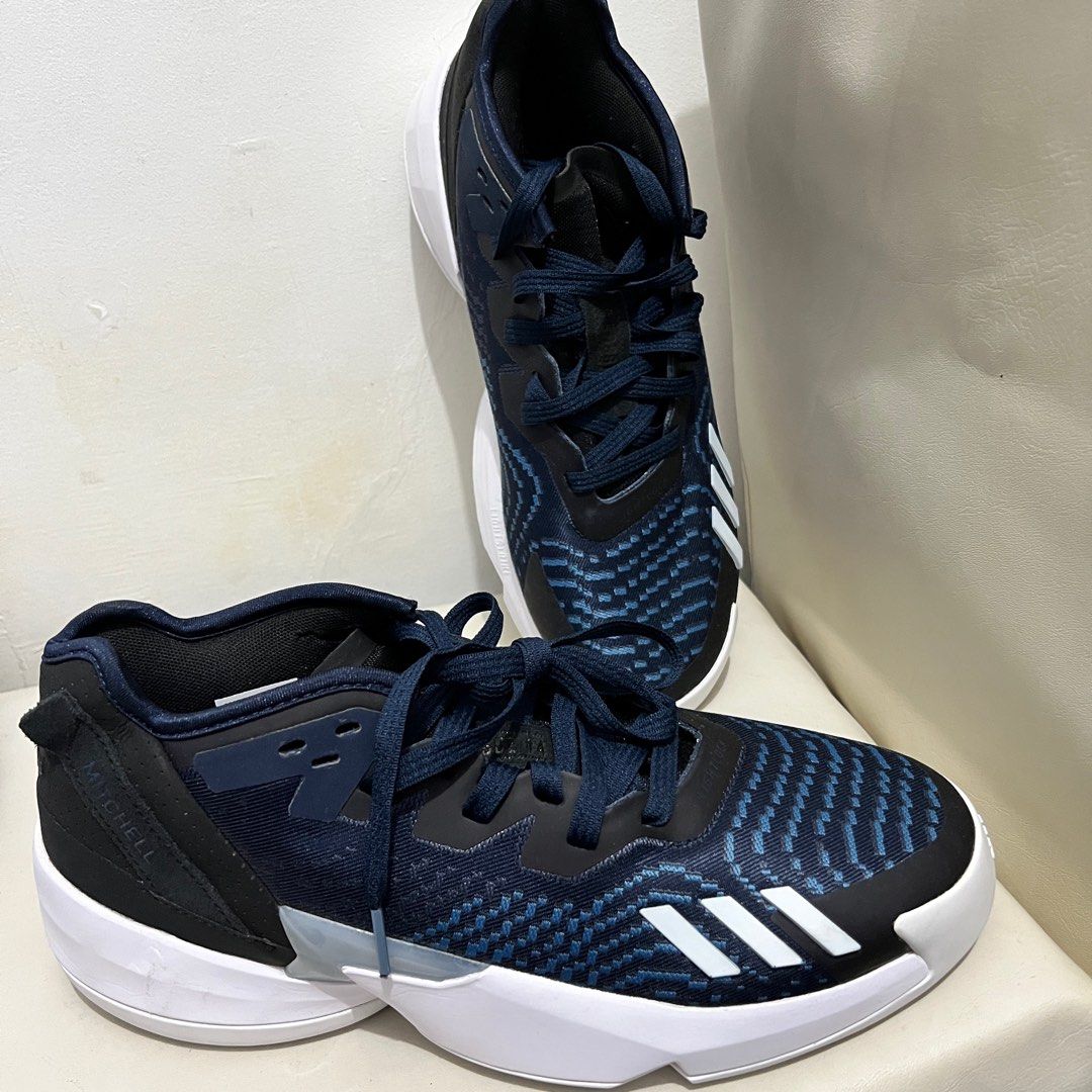 Adidas Donovan Mitchell (Category: Sneakers) located in Tiaong. Submitted by rmu57 (Listing ID 1410770149, Image 3). Description: - Adidas Donovan Mitchell basketball shoes - Color: Navy blue and white - Adidas logo on the side - D.O.N. branding on the heel - White midsole - Patterned outsole - Navy blue laces.