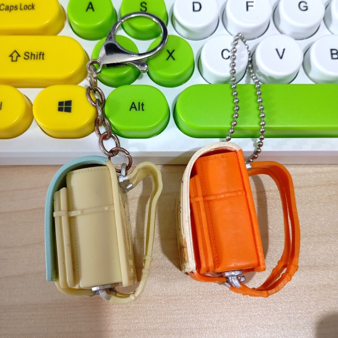 Authentic Sumikkogurashi Randoseru Charm Keychains (Category: Character Goods) located in Quezon City. Submitted by ana-chan (Listing ID 1410775559, Image 3). Description: Cute Sumikkogurashi school bag keychains! Two designs available: Sumikko characters and a cat with ice cream. Detailed design with straps and clasp. Perfect for keys or bags.sold per pc..
