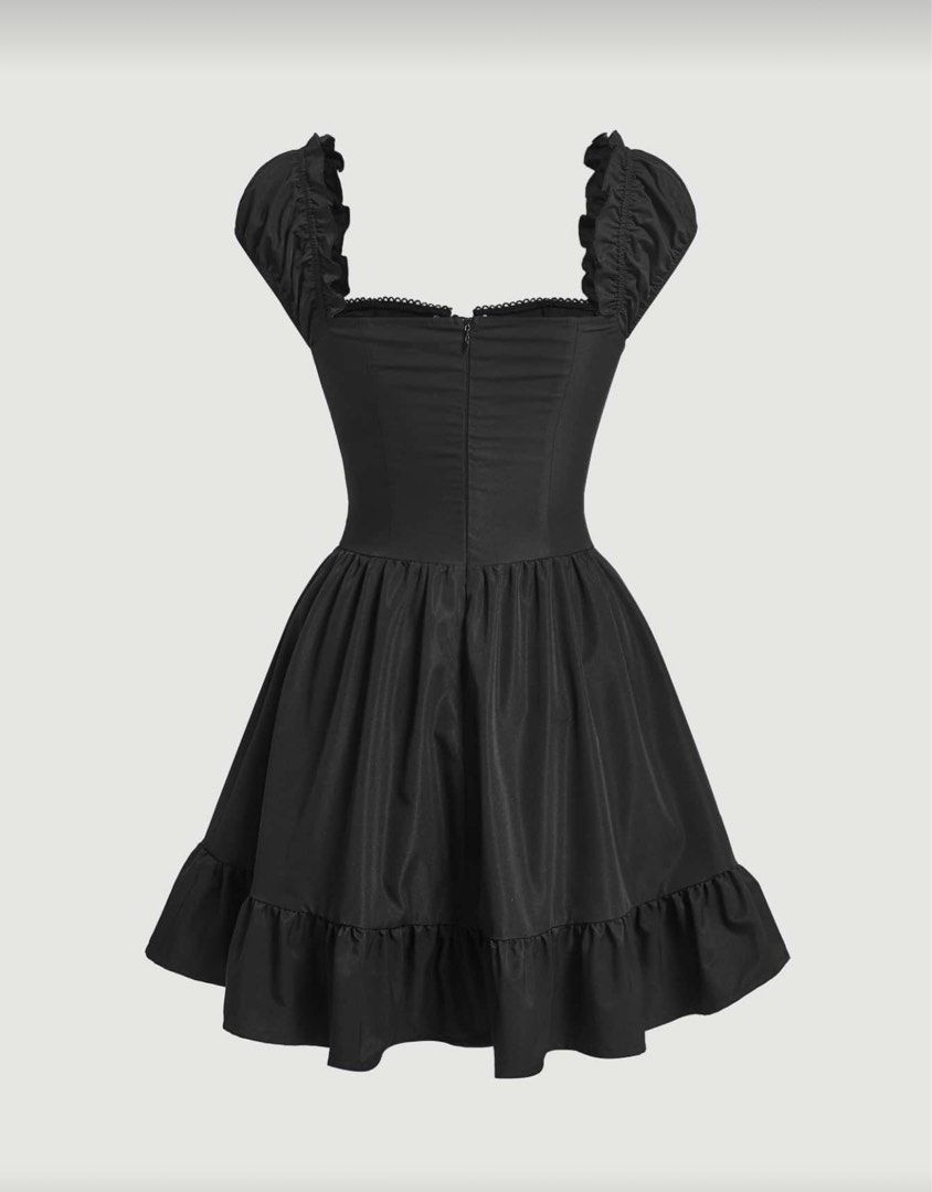 Black Corset Dress with Ruffle Hem (Category: Dresses) located in Mandaluyong City. Submitted by pretty_karia (Listing ID 1410894568, Image 2). Description: Size: 0XL - Black dress - Corset-style bodice with lace-up - Short, ruffled sleeves - Square neckline - Fitted waist, flared skirt - Ruffle hem - Zipper closure - Ideal for special occasions.