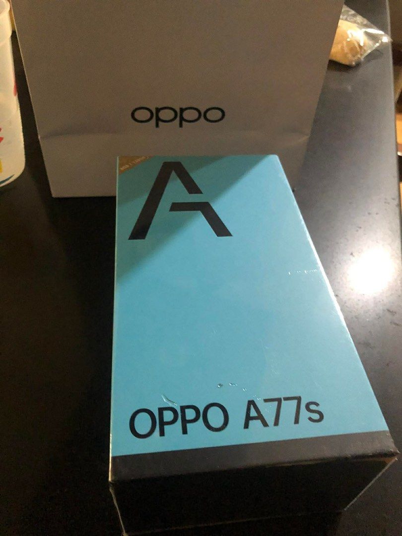 BNIB Oppo A77s (Category: OPPO) located in San Juan City. Submitted by annepie (Listing ID 1410797198, Image 1). Description: Selling a brand new Oppo A77s. Color: sunset orange Sealed in box with Oppo paper bag.