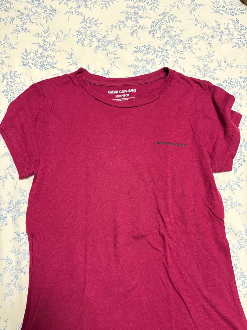 Calvin Klein Jeans Maroon Shirt (Category: Shirts) located in Quezon City. Submitted by wardrobelele (Listing ID 1410875357, Image 1). Description: - xs on tag but fits S - worn once or twice - no flaws.