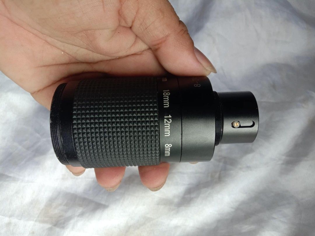 Celestron 8-18mm Zoom Eyepiece (Category: Lens & Kits) located in Quezon City. Submitted by jpnvintageonline (Listing ID 1410739435, Image 3). Description: - Celestron zoom eyepiece - Focal lengths: 8mm, 12mm, 18mm - Textured grip for easy handling - Clear lens - Black finish - Designed for telescopes - Celestron logo visible.