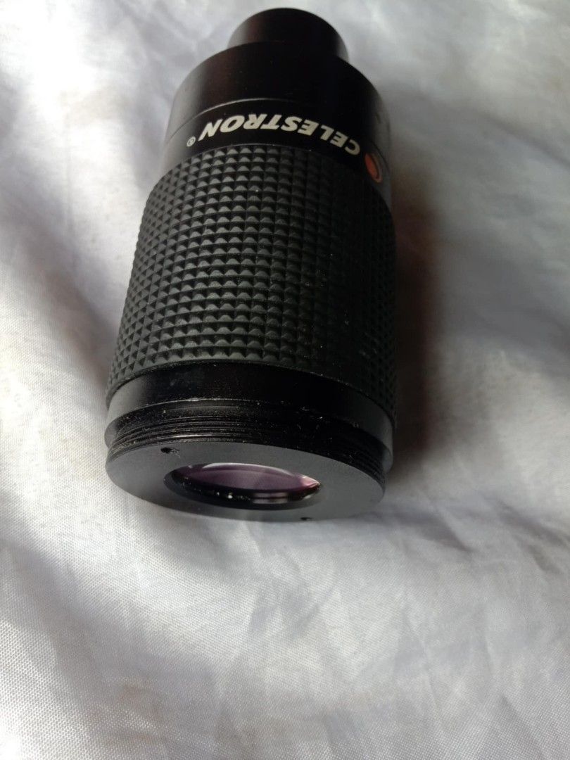 Celestron 8-18mm Zoom Eyepiece (Category: Lens & Kits) located in Quezon City. Submitted by jpnvintageonline (Listing ID 1410739435, Image 2). Description: - Celestron zoom eyepiece - Focal lengths: 8mm, 12mm, 18mm - Textured grip for easy handling - Clear lens - Black finish - Designed for telescopes - Celestron logo visible.