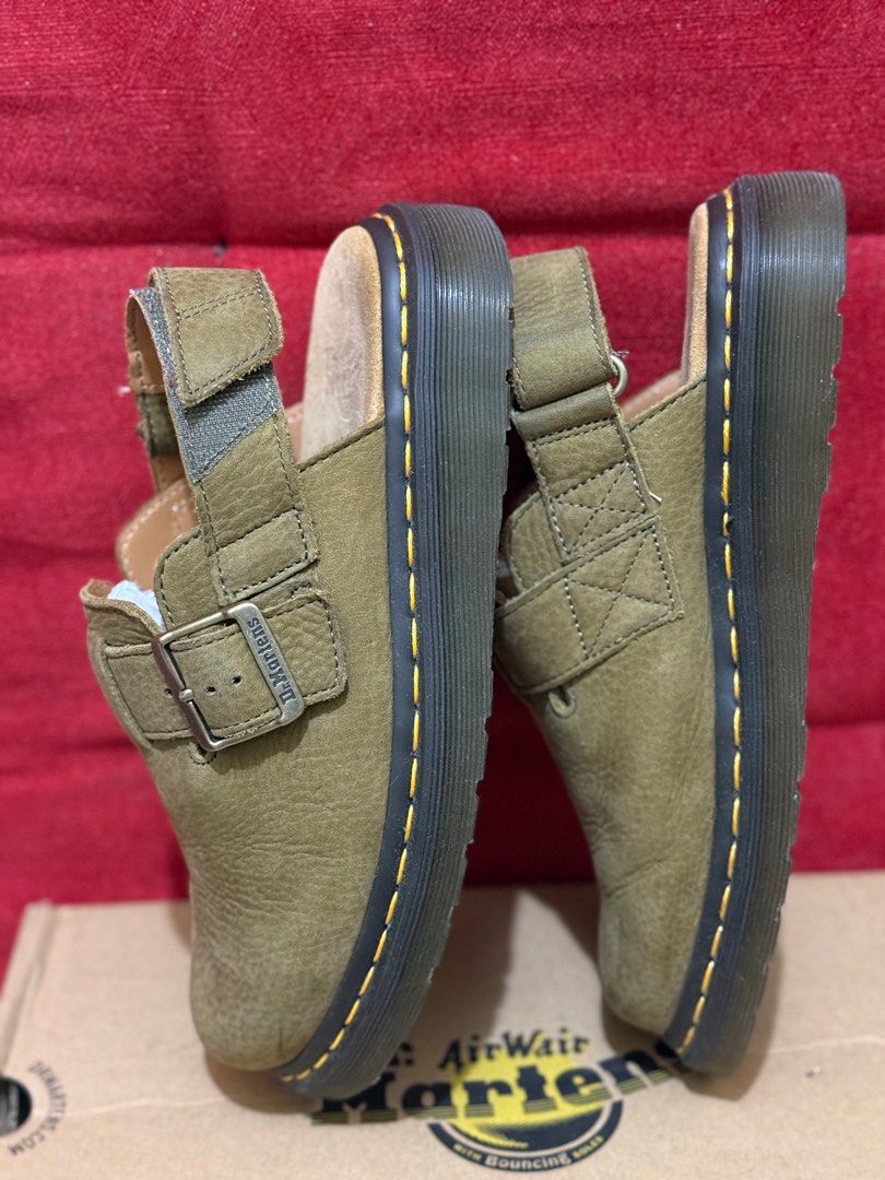 Dr. Martens Jorge II Muted Olive Sandals (Category: Slippers & Slides) located in Pasig City. Submitted by mschesca (Listing ID 1410725698, Image 2). Description: -Dr. Martens Jorge II sandals in muted olive. -Features adjustable straps with buckles. -The soles have the signature yellow stitching. -Comes with the original box. -Size US 7 (womens), US 6 (mens), UK 5, EU 38. -Made with tumbled nubuck leather..