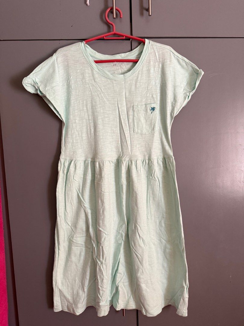 Gap Mint Dress (Category: Babies & Kids Fashion) located in Candaba. Submitted by decklattering (Listing ID 1410734794, Image 1). Description: XXL on tag can fit up 10-12 yrs old Used once only.