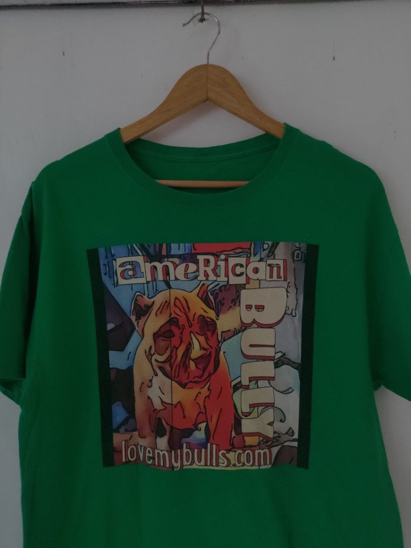 Green American Bully T-shirt (Category: Tshirts & Polo Shirts ) located in Cebu City. Submitted by watixx (Listing ID 1410807440, Image 2). Description: - Size L 21x28 - Green crew neck t-shirt - Features an American Bully graphic print - Print includes "American Bully" and "lovemybulls.com" - Made of a cotton blend.