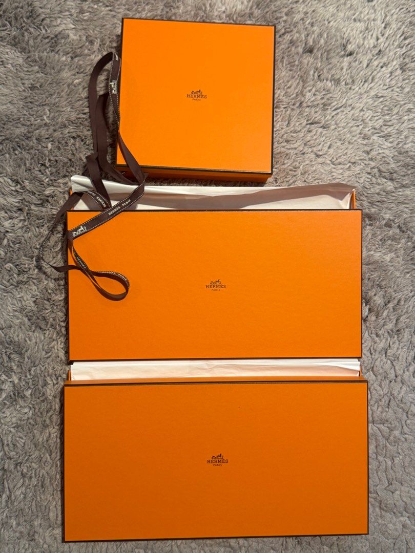 Hermes Orange Boxes with Ribbon (Category: Luxury Accessories) located in Manila. Submitted by hotdealsph (Listing ID 1410785137, Image 1). Description: - Set includes genuine Hermes orange boxes. - Comes with original ribbon - Boxes are in various sizes. - rectangular box : 18cm x 36cm small square box : 19cm, height 4cm .
