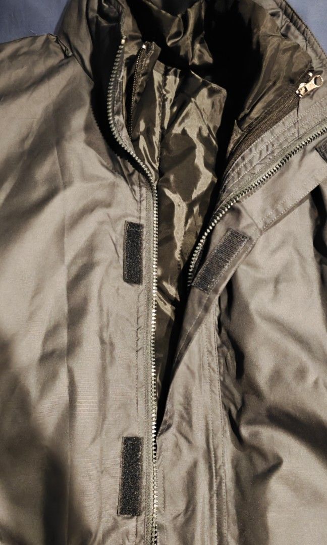 Jacket (Category: Coats, Jackets and Outerwear) located in Singapore. Submitted by sellthingthong (Listing ID 1410888425, Image 3). Description: An inconspicuous black standard Jacket that is a 2 piece unit - an outer water proof shell and and a detachable inner piece that can be worn as a jacket itself. Wearer is 174cm, regular built..