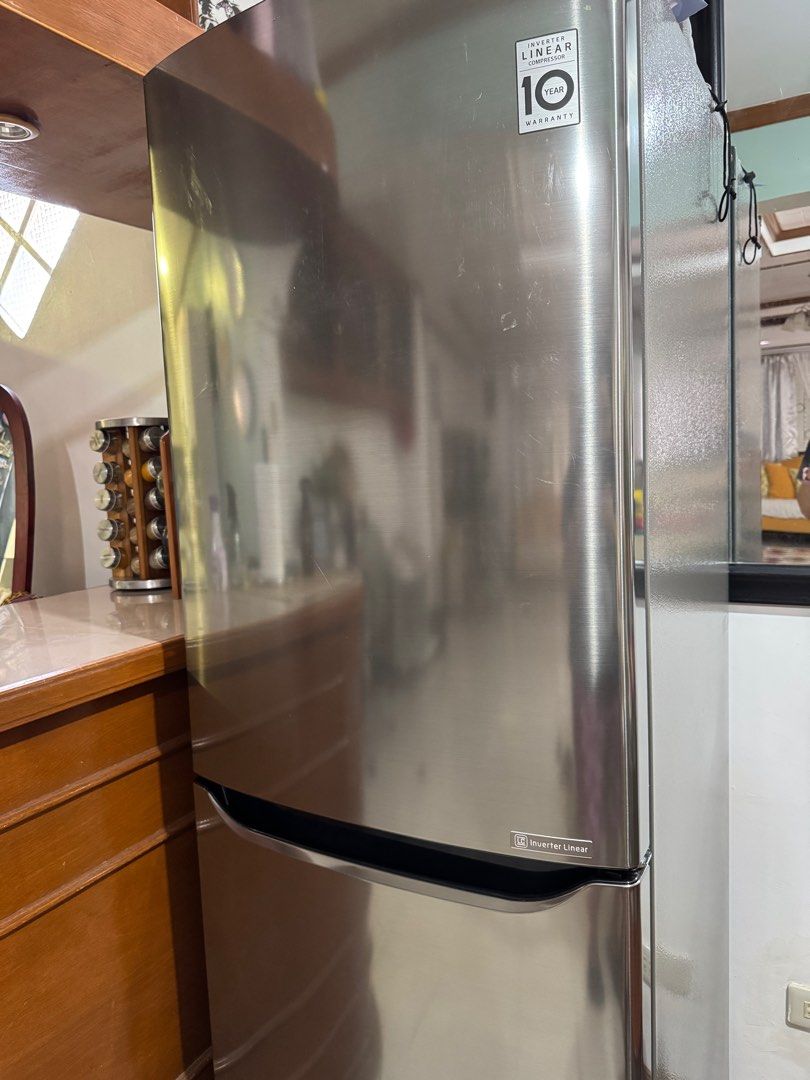 LG Inverter Linear Refrigerator (Category: Refrigerators and Freezers) located in Muntinlupa City. Submitted by mimitatsboutique (Listing ID 1410798494, Image 2). Description: - LG Refrigerator with Inverter Linear Technology - Stainless Steel Finish - Bottom Freezer Design - Modern Design - 10-Year Warranty Only issue: Compressor is for replacement upon checking. Can be bought online around 6k-7k.
