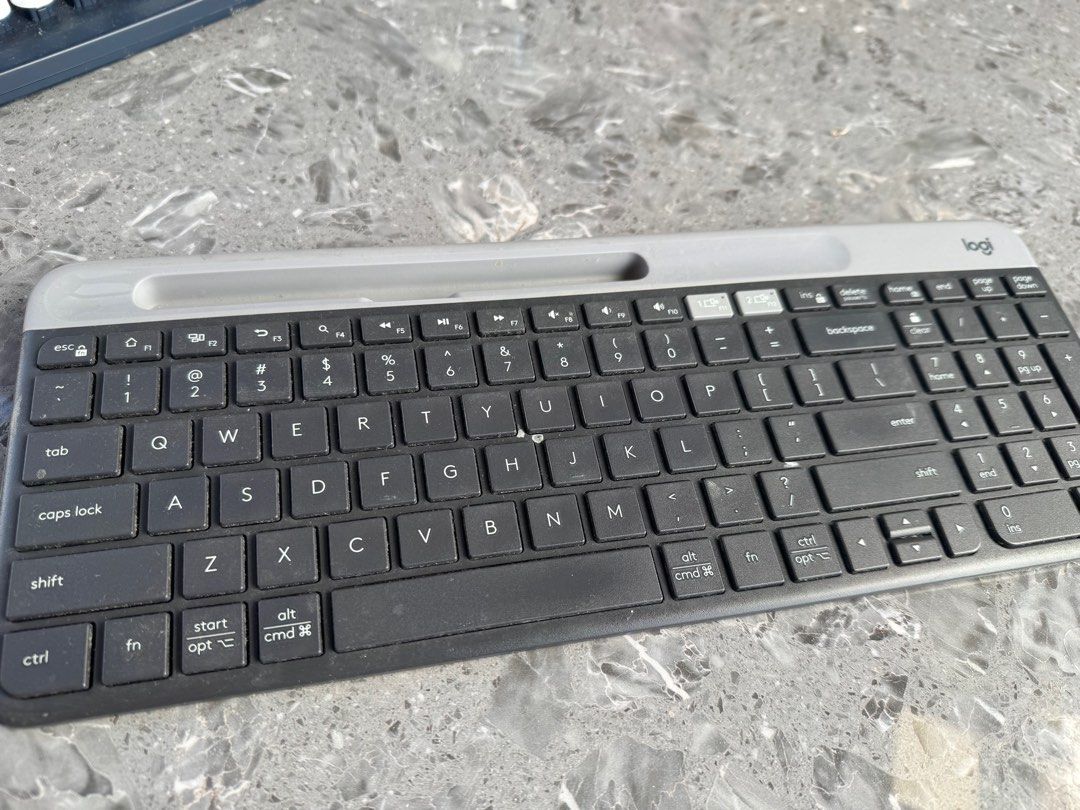 [Back to school] Logi Keyboard (Category: Computer Keyboard) located in Bacoor. Submitted by marnievera (Listing ID 1410792157, Image 1). Description: - Logi keyboard with a stylish dark grey and light grey color scheme. - Full-sized keyboard including a number pad. - Integrated stand for comfortable typing. - Black keys with clear white lettering..