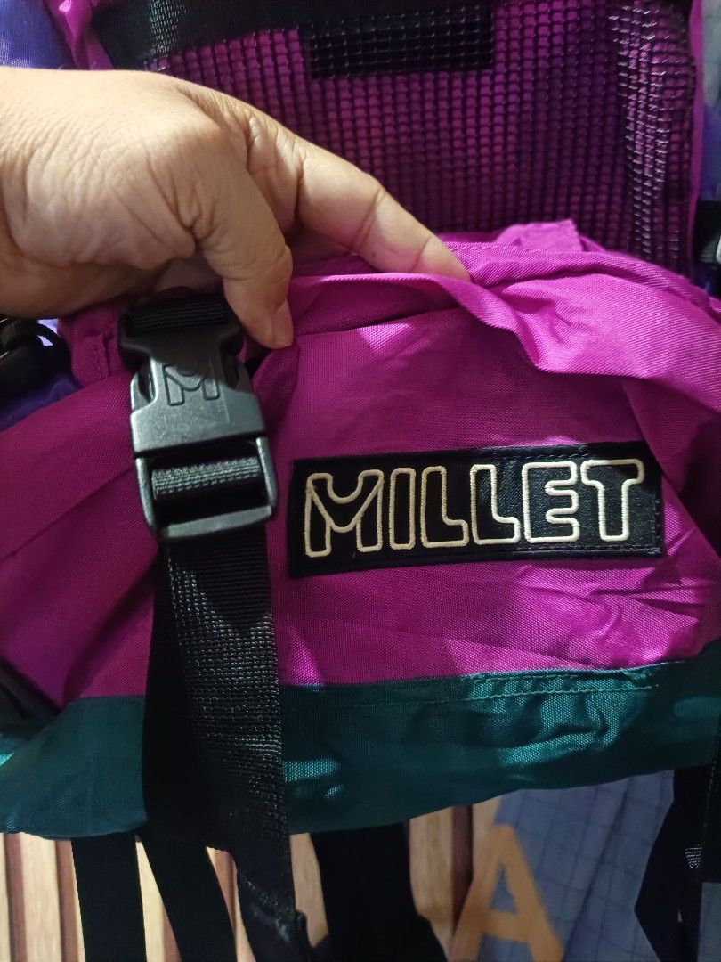 Millet Backpack (Category: Backpacks) located in Cebu City. Submitted by negotiableprice22 (Listing ID 1410889443, Image 2). Description: - Vintage Millet backpack - Eye-catching purple, teal, and black design - Multiple compartments for storage - Adjustable straps for a comfortable fit - Mesh front pocket - Millet logo detailing - Sturdy buckles - Comfortable back panel - Ideal for outdoor activities and daily use height 23 inch length 15 inch w