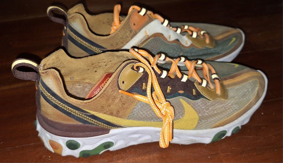 Nike React Element 87 (Category: Sneakers) located in Manila. Submitted by natehiggers1 (Listing ID 1410862207, Image 2). Description: - Nike React Element 55 sneakers - White sole with orange laces - Size: US 10, UK 9, EUR 44, 28 cm - Made in Vietnam Just dusty. No box. Meetup in any Lrt/mrt stations shipping via j&t, jrs, lbc, lalamove, angkas padala, grab shipping must be shouldered by buyer.