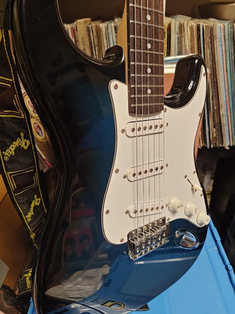 Photogenic Electric Guitar with Amplifier (Category: Musical Instruments) located in Quezon City. Submitted by jhayjaz08 (Listing ID 1410722285, Image 3). Description: Rush!! - Photogenic electric guitar stratocaster - Blue and white finish - White pickguard - Three pickups - Includes Photogenic PG-10 guitar amplifier - Fender guitar strap included Very good condition 6k set.