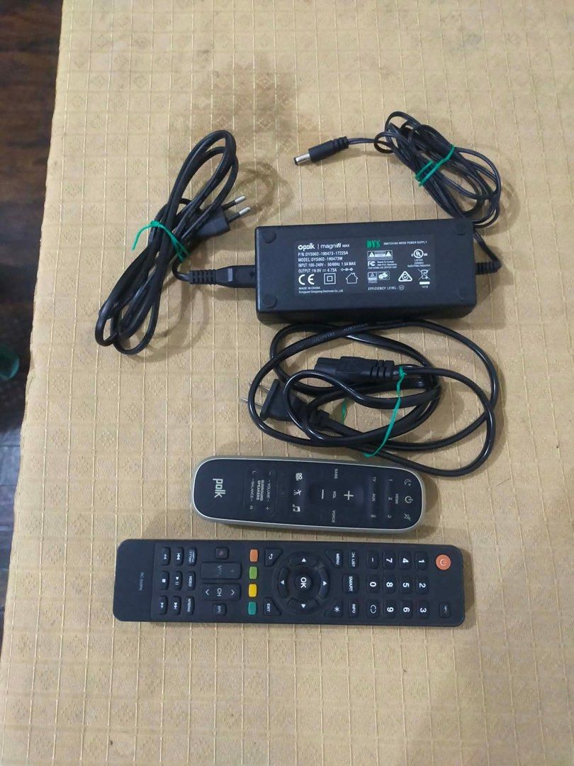 Audio Soundbar with Remote POLK (Category: Soundbars, Speakers & Amplifiers) located in Paranaque City. Submitted by enchanting_f1nds (Listing ID 1410899408, Image 3). Description: Polk Audio soundbar with two remotes and power adapter. The soundbar is black. The subwoofer is approximately 15 inches tall. Includes a power adapter and two remotes. The soundbar is approximately 39 inches long. The subwoofer has a Polk logo on top..
