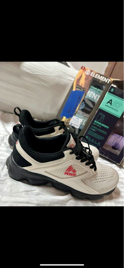 RBX White and Black Rubber Shoes (Category: Sneakers) located in Manila. Submitted by bingnthings (Listing ID 1410771893, Image 1). Description: - RBX sneakers - Color: White and Black - Design: Mesh front - Logo: RBX visible - Soles: Black, durable material - Laces: Black - Condition: Brand New.