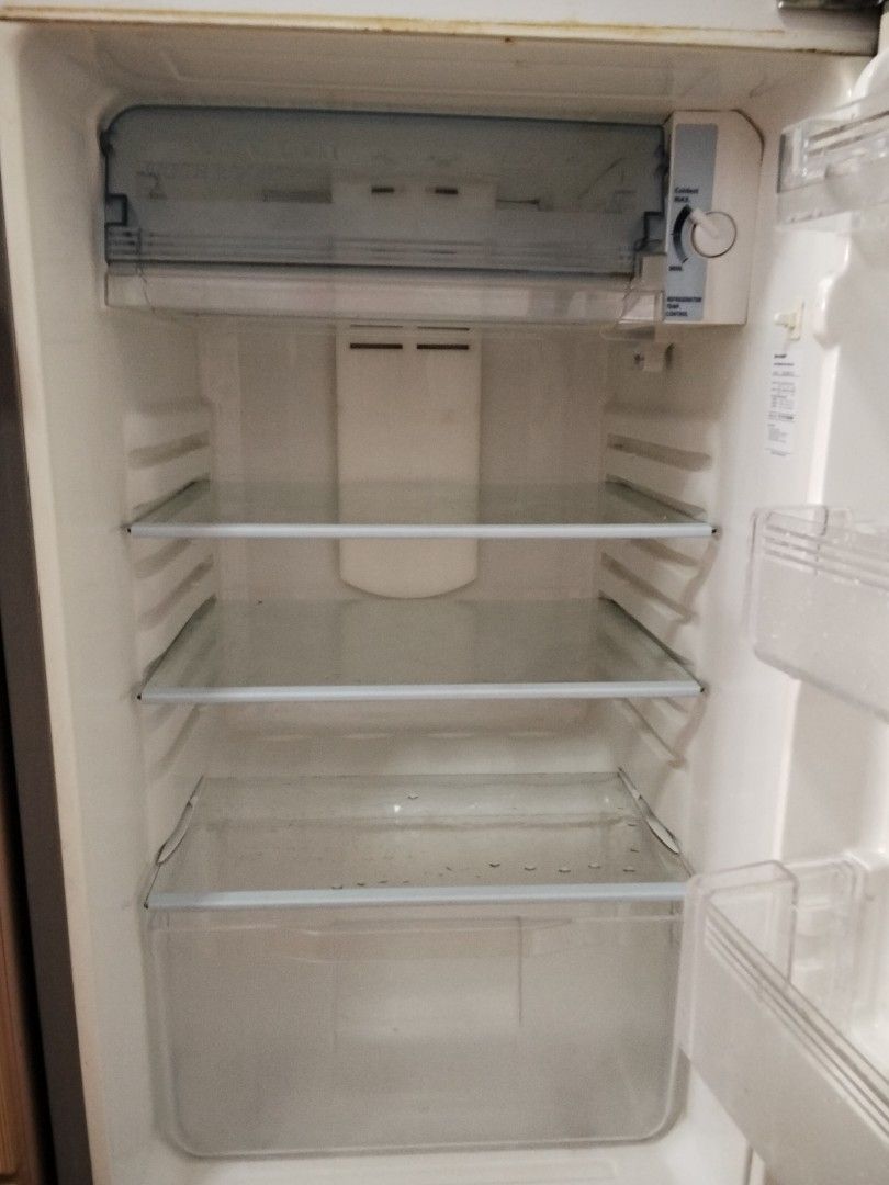 Sharp Fridge (Category: Refrigerators & Freezers) located in Singapore. Submitted by 16g00dstuff (Listing ID 1410729049, Image 4). Description: Well-used fridge, working well. Inside already cleaned. Buyer need to arrange own transport. specification is at picture 5th & 6th.