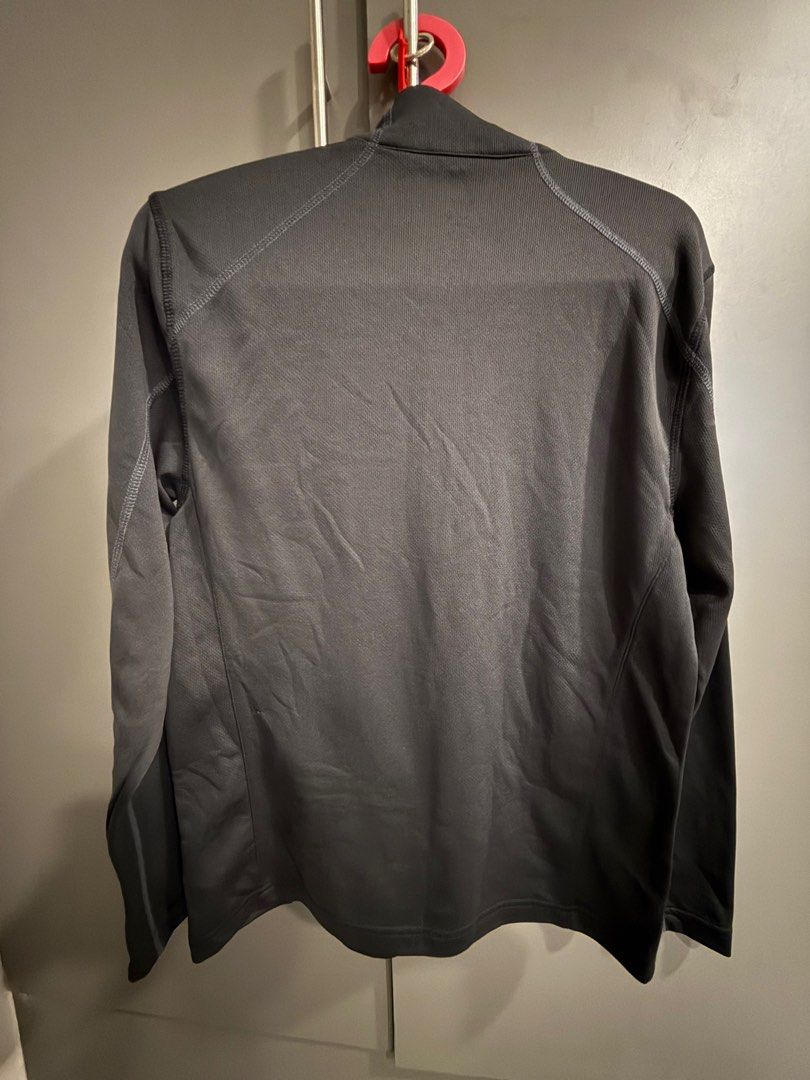 Spyder Black Half-Zip Jacket (Category: Coats, Jackets and Outerwear) located in Makati City. Submitted by joyfulliving22 (Listing ID 1410799947, Image 2). Description: - Black Spyder half-zip jacket - Size: S/CH - Features a mock neck - Long sleeves - Zipper closure - Made in Egypt - Simple design with visible stitching.