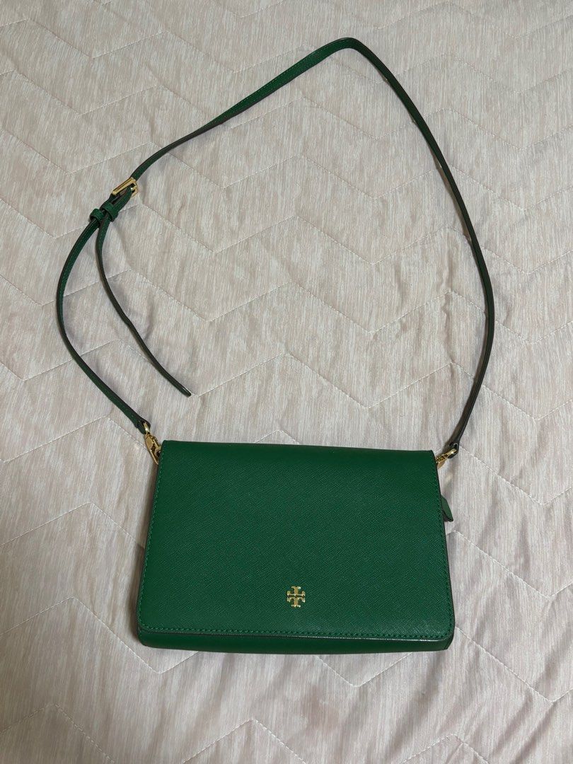 Tory Burch Green Crossbody Bag (Category: Luxury Bags & Wallets) located in Quezon City. Submitted by gtancollection (Listing ID 1410862814, Image 2). Description: Authentic Tory Burch crossbody bag Color: Emerald Stone Material: Saffiano Leather Dimension: Height: 6” ; length: 9” ; depth: 2.5” Adjustable, removable shoulder/crossbody strap with 20-22.5” drop Holds an iPhone Pro Max Rolled gold hardware Magnetic Snap closure Dust bag is NOT inclu