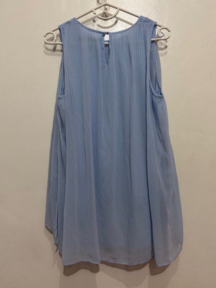 Zara Light Blue Asymmetrical Flowy Top (Category: Sleeveless) located in Mandaluyong City. Submitted by minasitems (Listing ID 1410887015, Image 3). Description: Used only a few times! Very nice top RFS: Not my style anymore Size on tag: M 📌 Dimensions (when laid flat): Width: 18 inches Length: 25 inches 📌 MOP: GCash 📌 MOD: Lalamove/Grab, J&T, GGX, LBC 📌 Location: Mandaluyong/Ortigas.