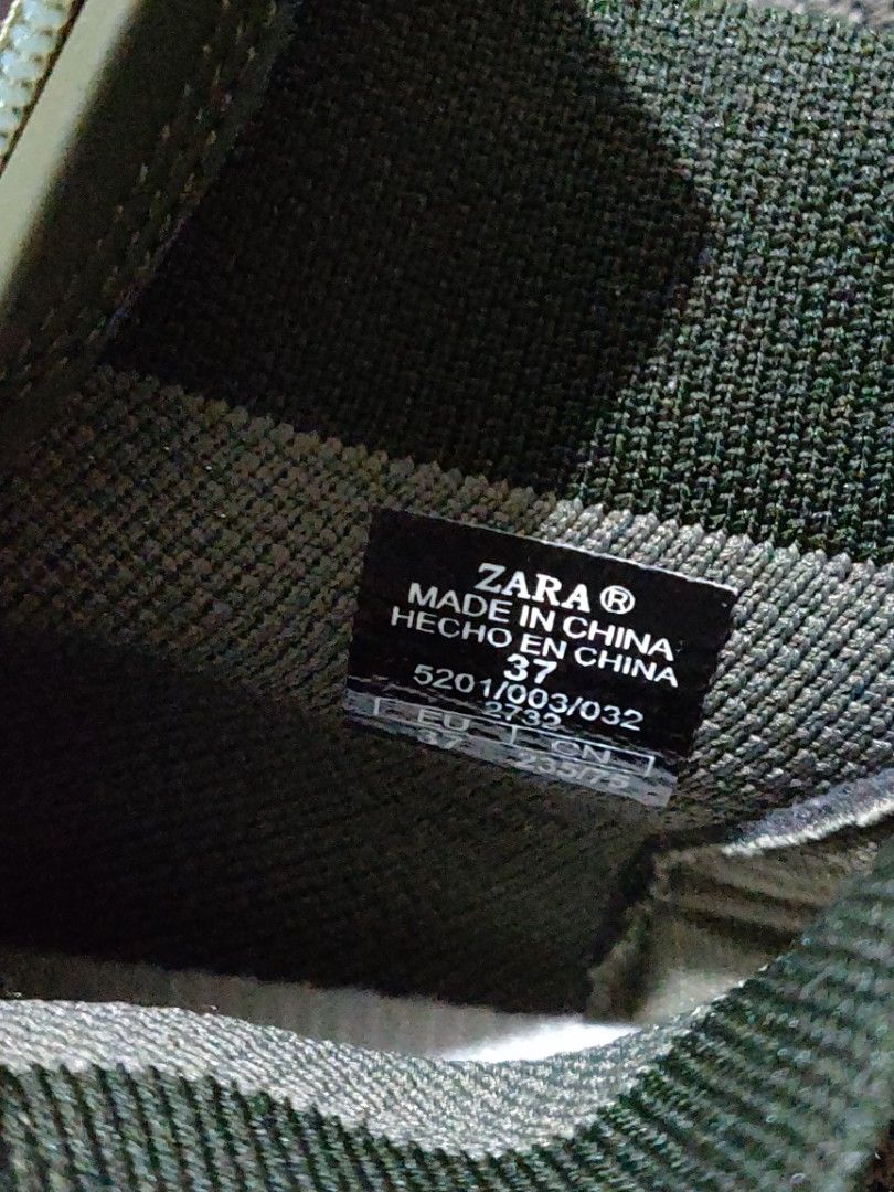 Zara Olive Green Sneakers Size 37 (Category: Sneakers) located in Valenzuela. Submitted by jaypee.jaypee (Listing ID 1410899809, Image 2). Description: - Zara sneakers in olive green - Size 37 - Zip closure - White sole - Excellent, unworn condition - Made in China.