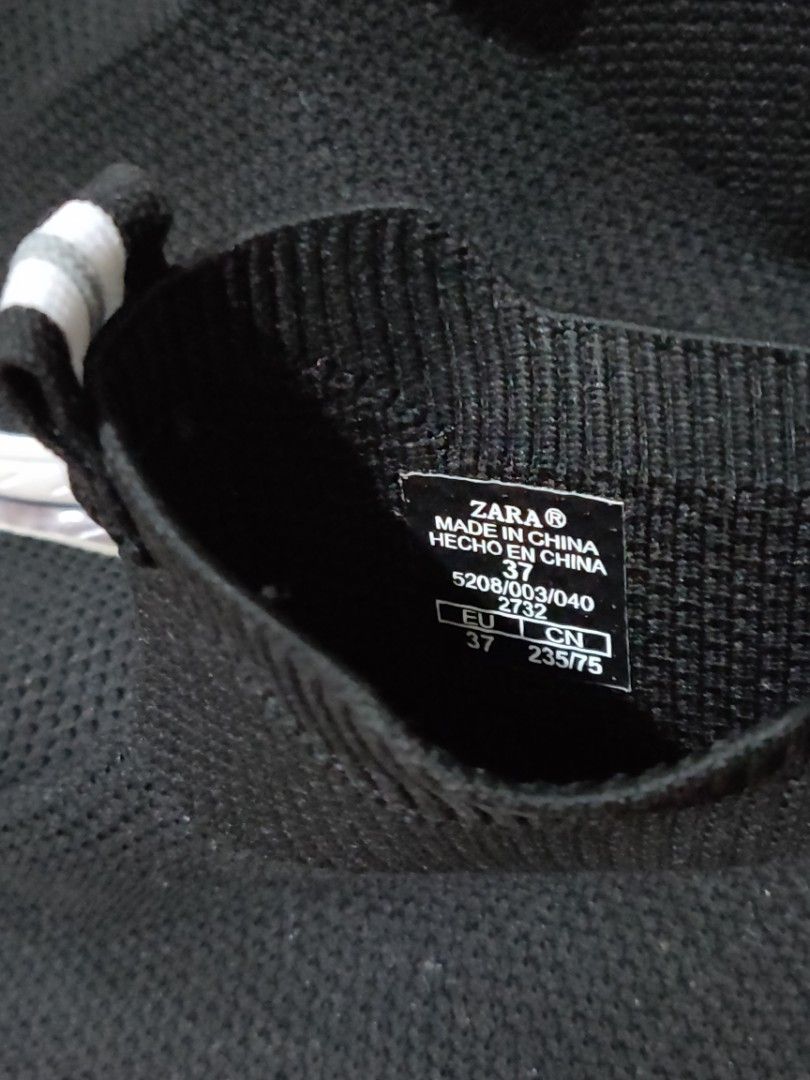 Zara Sock Sneakers Size 37 (Category: Sneakers) located in Valenzuela. Submitted by jaypee.jaypee (Listing ID 1410899668, Image 2). Description: - Zara sock sneakers - Black knit upper - White sole - Size: EU 37, CN 235/75 - Pull tab with white stripes - Made in China.