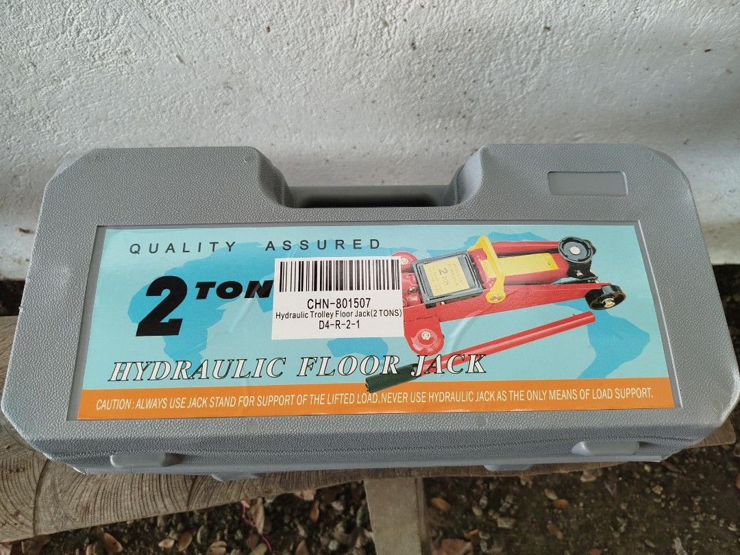2 Ton Hydraulic Floor Jack (Category: Construction Tools & Equipment) located in Quezon City. Submitted by poortwenty (Listing ID 1410967595, Image 2). Description: Hydraulic floor jack is rated for 2 tons. It comes in a gray carrying case. The jack is red and yellow. The minimum height is 128mm and the maximum height is 280mm. It is a trolley floor jack. Always use a jack stand for support of the lifted load. Never use the hydraulic jack as the 