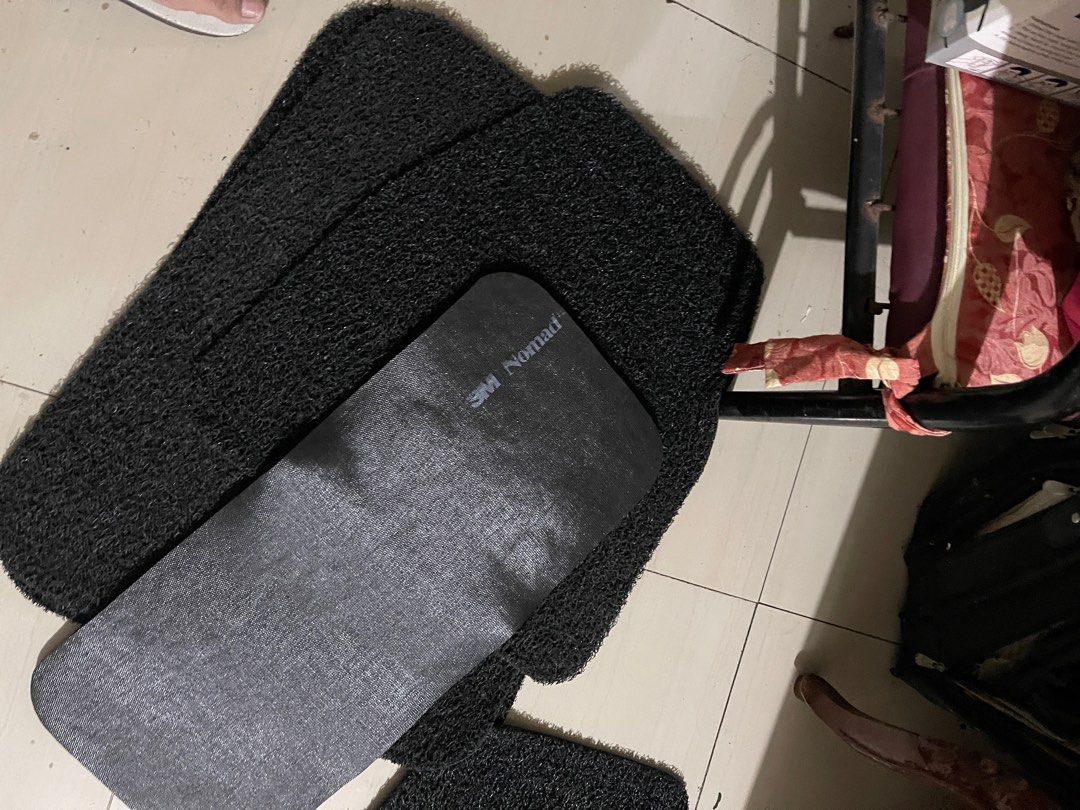 3M Nomad Car Floor Mats (Category: Other Automotive Parts and Accessories) located in Caloocan City. Submitted by freemountain-5e8de1 (Listing ID 1411075531, Image 2). Description: - Complete set of car floor mats - Includes mats for front and back seats - Features 3M Nomad mat with metal plate - Durable, textured black material - Provides comprehensive coverage.