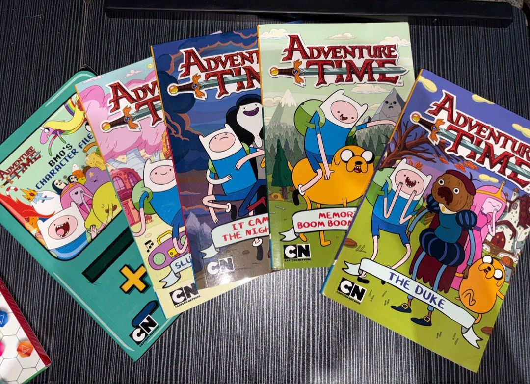 Adventure Time Book Bundle (Category: Children's Books) located in Batangas. Submitted by beststylesince2019 (Listing ID 1410965253, Image 2). Description: Preloved Books Please manage uour expectations as these books are preloved. Payment first policy. MOP:Gcash/Bank Transfer MOD:JNT or Lalamove.