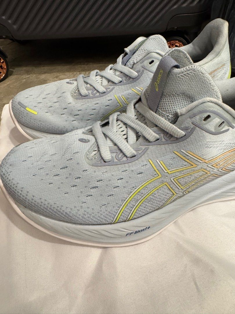 ASICS GEL-Cumulus 24 Running Shoes - Size 39.5 (Category: Sneakers) located in Singapore. Submitted by knakma1215 (Listing ID 1411076763, Image 1). Description: - ASICS GEL-Cumulus 24 running shoes - Size: 39.5 - Condition: Excellent - Color: Light blue and yellow - Suitable for running and casual wear - Can be unisex.