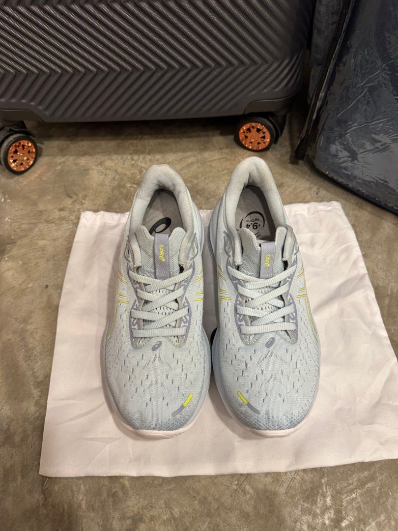 ASICS GEL-Cumulus 24 Running Shoes - Size 39.5 (Category: Sneakers) located in Singapore. Submitted by knakma1215 (Listing ID 1411076763, Image 2). Description: - ASICS GEL-Cumulus 24 running shoes - Size: 39.5 - Condition: Excellent - Color: Light blue and yellow - Suitable for running and casual wear - Can be unisex.