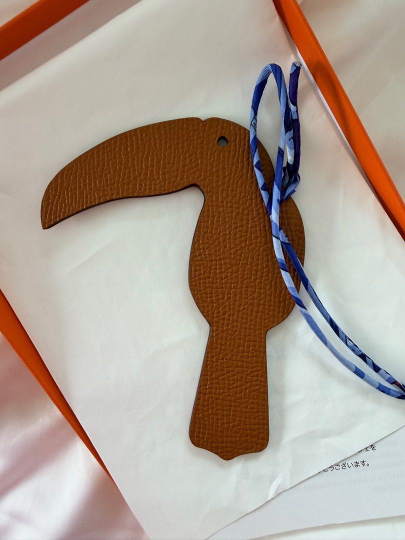 Authentic Hermes Toucan Bag Charm (Category: Luxury Accessories) located in Quezon City. Submitted by breakmyfashion (Listing ID 1411032975, Image 2). Description: Features a leather toucan design Includes a silk strap. Comes with box. .