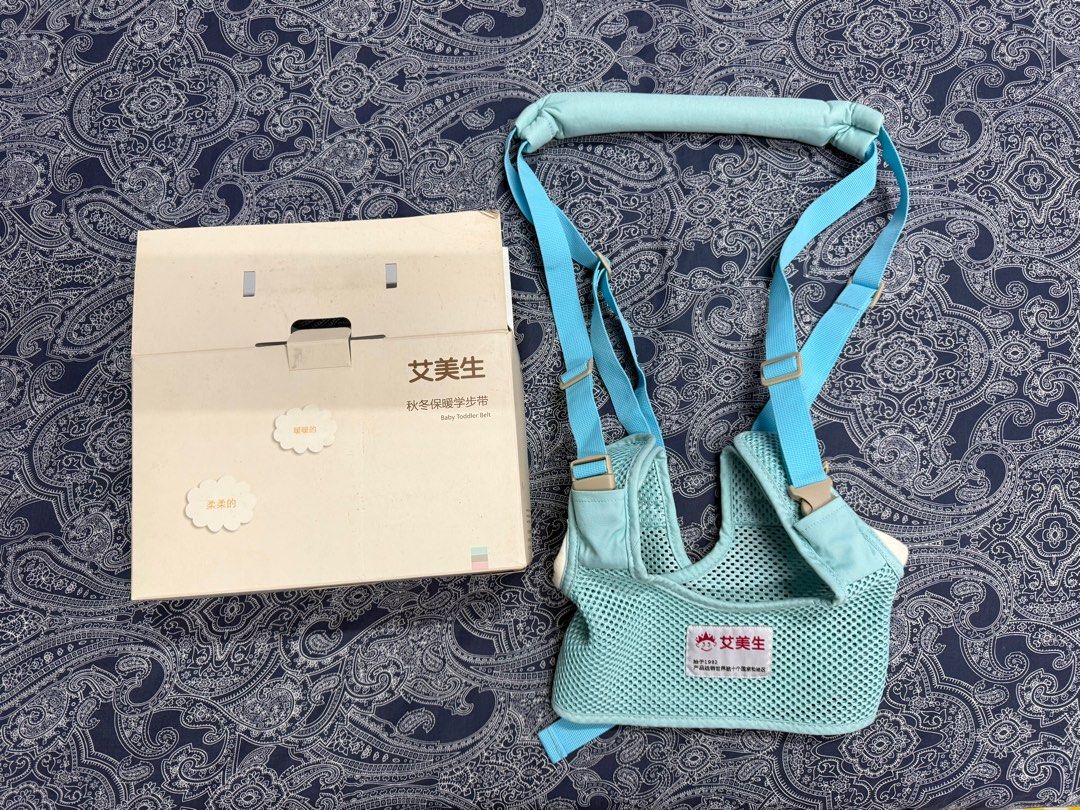 Baby Toddler Walking Assistant Harness (Category: Infant Playtime) located in Quezon City. Submitted by pau.pm (Listing ID 1410902474, Image 1). Description: - Helps babies learn to walk safely. - Breathable mesh design for comfort. - Adjustable straps for a secure fit. - Includes original box. - Supportive tool for early walking development..