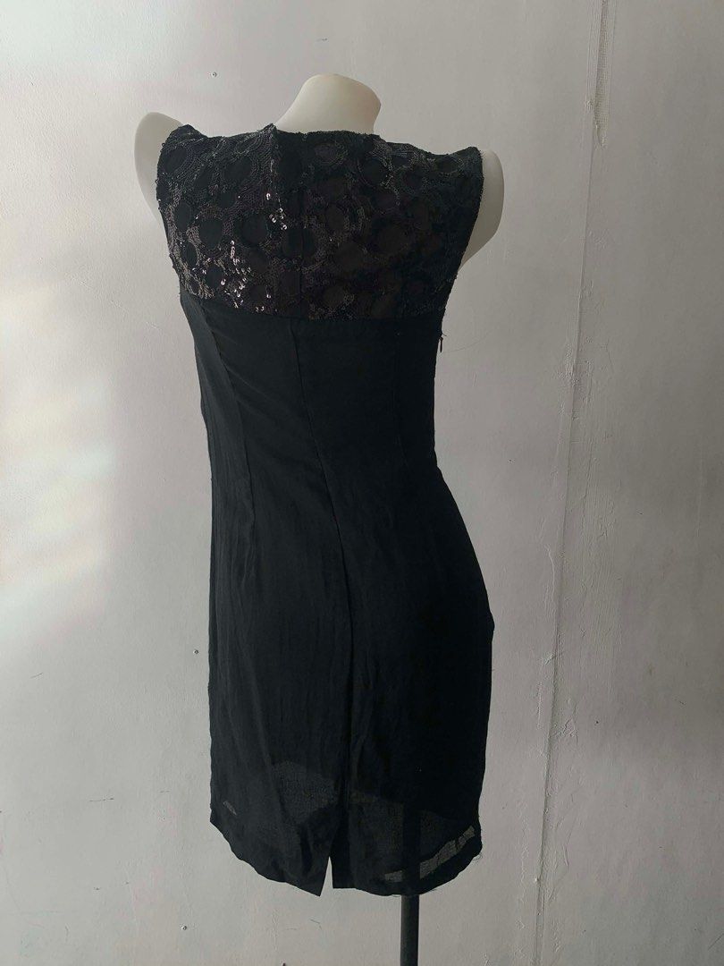 Bebe Black Dress with Red Bow (Category: Dresses) located in Cavite. Submitted by cssndrakateg (Listing ID 1410972147, Image 2). Description: - Bebe black dress - Red bow detail - Sequined lace neckline - Size S - Flattering silhouette - Perfect for special occasions - Zipper closure at the back.