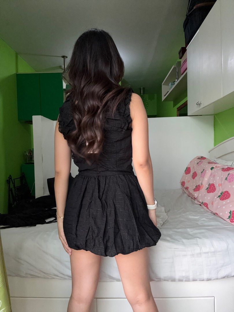 Black Dress with Ruffles and Bow (Category: Dresses) located in Makati City. Submitted by fia0604 (Listing ID 1410646883, Image 3). Description: - Black V-neck dress - Bubble skirt design - Ruffle and bow details - Textured fabric - Fitted bodice - New with tag - With bloomer shorts stitched in Bought from Vietnam. Never been worn Rfs: decluttering.