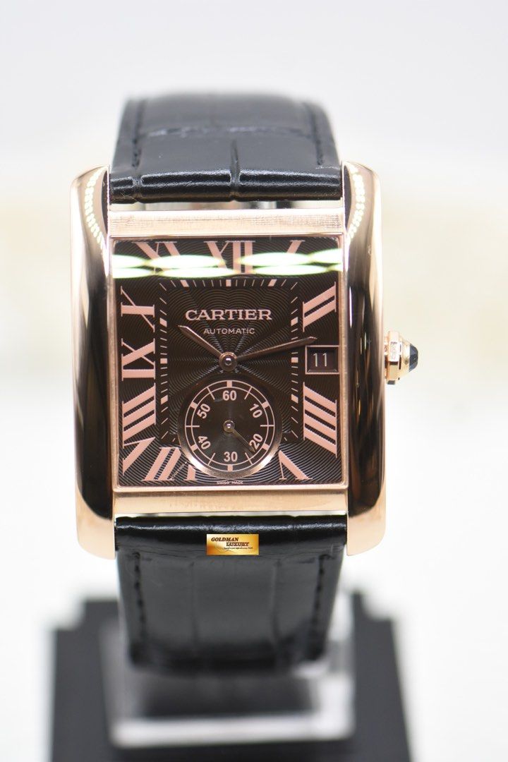 CARTIER TANK MC LARGE MEN’S ROSE GOLD IN LEATHER STRAP AUTOMATIC W5330002 (MINT) (Category: Watches) located in Singapore. Submitted by goldmanluxury (Listing ID 1411011588, Image 1). Description: Item No : GML4386 DESCRIPTION : Cartier Tank MC Large Men’s Rose Gold in Leather Strap Automatic. Ref: W5330002. No: 3590 DIAL : Brown Guilloche dial, Printed Roman Numerals and Blue hands. Sapphire Crystal. CASE : 34mm X 44mm Rose Gold case – original 