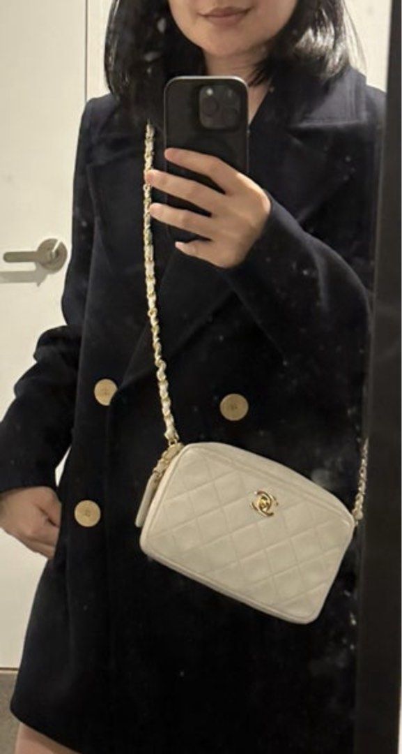 Chanel Quilted Camera Bag (Category: Luxury Bags & Wallets) located in Taguig. Submitted by bianca625 (Listing ID 1410975797, Image 1). Description: - Authentic Chanel camera bag - Classic quilted design - Elegant gold chain strap - Iconic CC logo detail With card, dustbag Vintage, 24k gold plated.