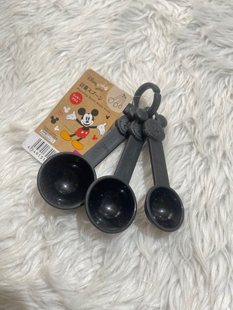 Disney Mickey Mouse Measuring Spoons (Category: Bakeware) located in Bayambang. Submitted by foursiblings081228 (Listing ID 1410969083, Image 2). Description: Set of Disney Mickey Mouse measuring spoons. Available in black and red. Each set includes three spoons of different sizes. The spoons are attached to a ring for easy storage. Perfect for measuring ingredients in the kitchen. Brand new with tags. ₱300 each J&t 📍Bayambang, Pangasinan.